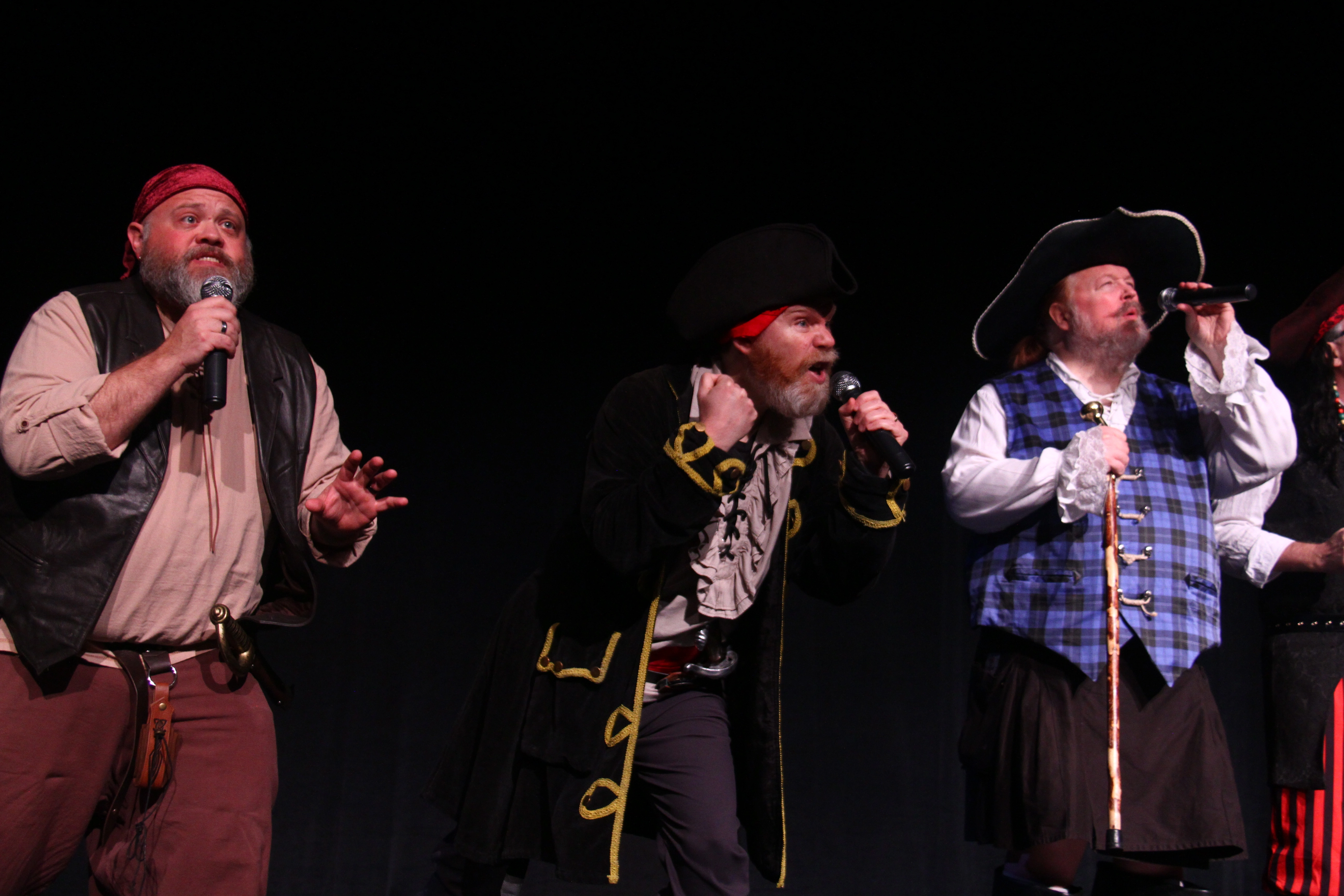 Pirate crew singing on stage